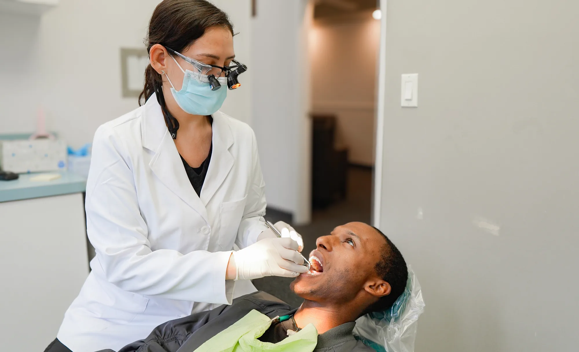 Dr. Lisa Rivas performing a dental exam